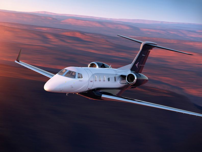 Phenom-300E_Exterior-Flight-Sunset copy- 11w.jpg